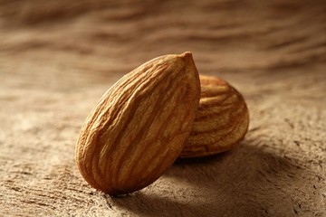 Almond macro over wood background
