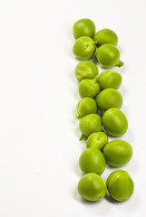 Green peas on white