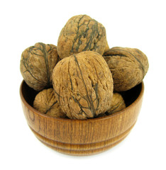 Walnuts in wooden dish