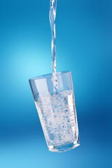 Water being poured into a glass