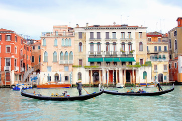 Fototapeta na wymiar Italy, Venice gondola and buildings on the grand canal