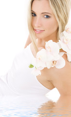Obraz na płótnie Canvas blonde in cotton underwear with orchid