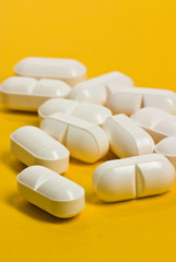 medicaments on yellow background