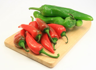 Red and Green chile angle view on cutting board