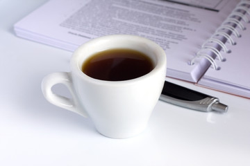 coffebreak (coffee, notebook and pen)