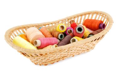 Birch bark basket with reels of thread