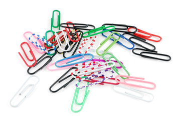 Colored paper clips isolated on white