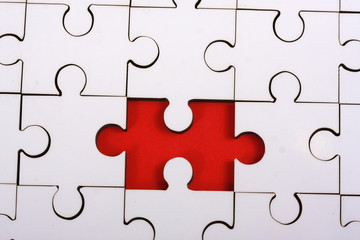 Fototapeta premium Red Jigsaw piece