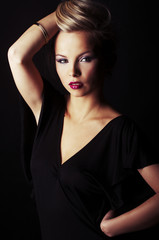 Fototapeta premium sexy blond girl on black background