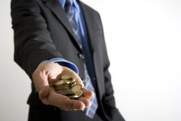 Businessman with Coins in His Hand