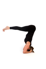 woman in yoga pose on white