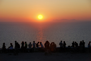 People watching sunset