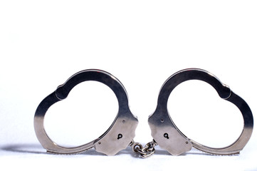 Modern Handcuffs isolated over white background