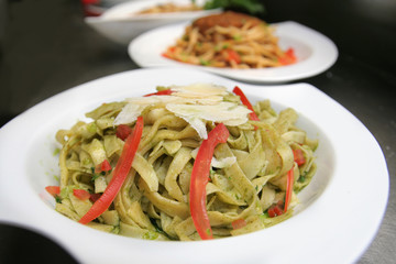 fettuccine marinara, spaghetti at background