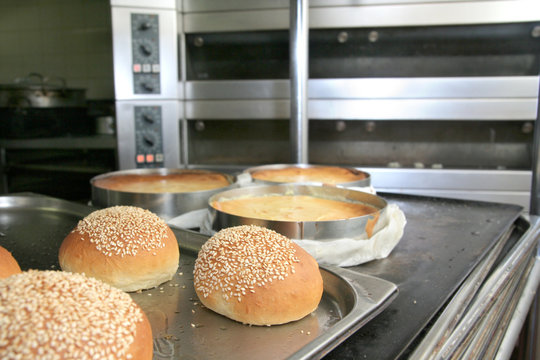 bread in pastry kitchen, oven at background