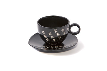 Tea-things in asian style with hieroglyphics. Path incl.