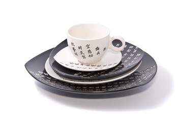 Tea-things in asian style with hieroglyphics. Path incl.
