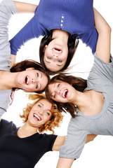 Group of four young adult happy girls