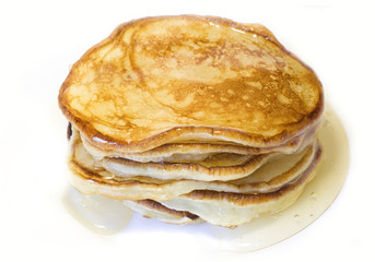 Pile of pancakes with honey