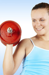 beautiful girl holds  dumbbells