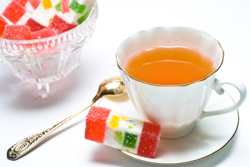 Cup of tea and sweet candy