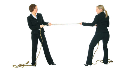 two businesswomen pulling rope with each another