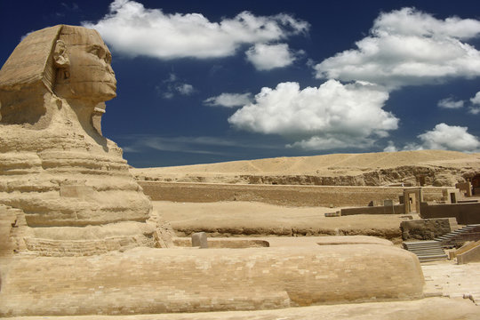Symbol Egypt's - Sphinx with blue sky and clouds in Giza, Cairo