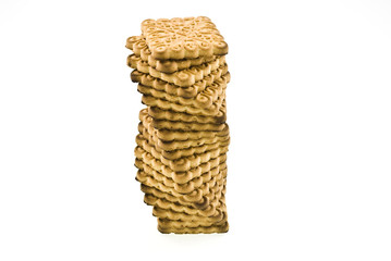 tower of cookies on white background