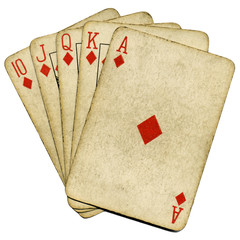 Royal flush old vintage poker cards isolated over white.
