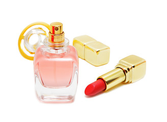 Perfume bottle and red lipstick