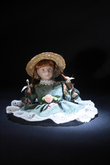 Nice antique dolly on dark background