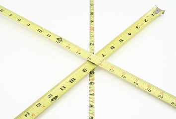Tape measures crossing