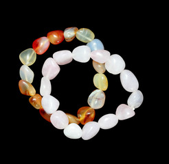 stoned hand bracelets isolated on black
