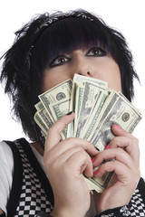 woman holds cash