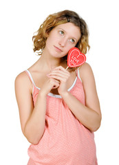 Girl with red heart shaped candy