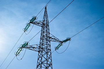 electricity pylon in blue sky