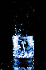 Glass of splashing water