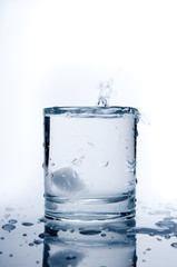 Glass of splashing water