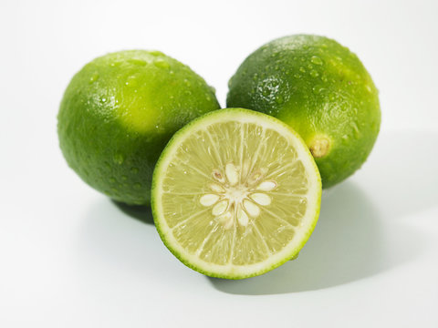 cut of limes  on the white back ground