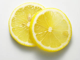 slices of  lemon on the white back ground