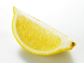 a slice of lemon on the white background