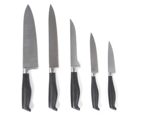 A small collection of kitchen knives. 5 different knives on whit