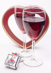 little gift and couple wineglass with heart