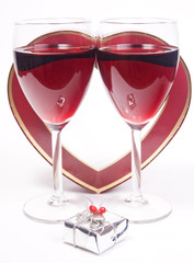 little gift and couple wineglass with heart