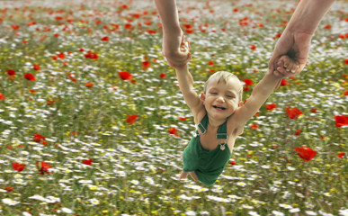 flying baby on flowers background