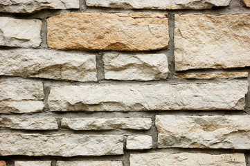 Fragment of rough brick wall