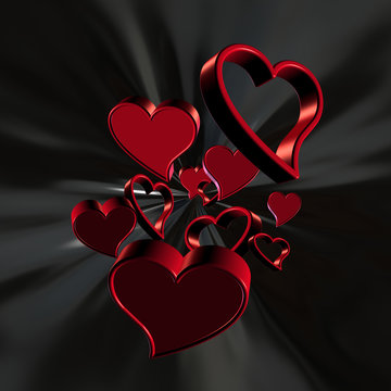 3D red hearts on a black background