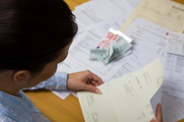 Woman with unpaid bills
