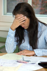 Woman with unpaid bills