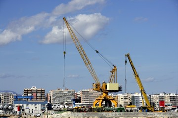Fototapeta na wymiar Crane in Santa Pola harbor, Spain
